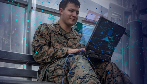 Servicemembers working with new technology